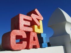 the letters ez cat are made out of blocks and placed on top of each other