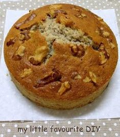 a close up of a muffin on a napkin with words written in the middle