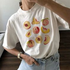 You can find similar graphic tee at boogzel #fyp #follow #makemefamous #graphic #teenfashionoutfits #fashion #fashionista #fashionable #jeans#watch Aesthetic Fruit, Peach Graphic, Thrifted Fashion, Outfit Planning, Fruit Shirt, Peach Shirt, Crop Pullover, Shirt Aesthetic, Boho Shirt