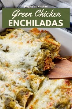 green chicken enchiladas in a casserole dish with a wooden spoon