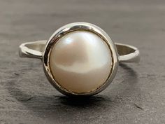 Vintage Pearl Sterling Silver Solitaire Ring, UK Size O1/2, US Size 7 1/4, EU Size 54 1/2, Front Max Width 11.1mm, Weight 3.25 Grams, Lovely Condition Hypoallergenic Round Pearl Ring For Anniversary, Hypoallergenic Pearl Ring For Anniversary, Everyday Silver Pearl Ring, Nickel Free Classic Round Rings, Classic Nickel Free Round Rings, Sterling Silver Hoop Earrings, Vintage Pearls, Hinged Bangle, Sterling Silver Hoops