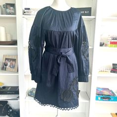 Adorable Cynthia Rowley Navy Blue Tulip Puffy Sleeves Dress With Matching Belt And Two Pockets. Beautiful Tulip Details In Sleeves And Around Hem. Fabric Is 98% Cotton And 2% Elastane Allowing And Creates A Flattering Effect When Worn. Pair With A Pair Of Wedges Or Flats Or Dress It Up With Heels. Size Xtra Small, But Fits More Like A Small Dry Clean Only Blue Lace Trim Dress For Fall, Navy Dress For Spring Brunch, Spring Navy Dress For Brunch, Spring Navy Long Sleeve Mini Dress, Navy Midi Dress For Spring Daywear, Navy Knee-length Dress For Spring, Navy Knee-length Spring Dress, Navy Mini Length Spring Dresses, Navy Mini Dress For Spring