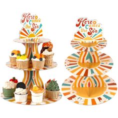 three tiered cupcake display stands with colorful designs on the top and bottom, each holding different types of cupcakes