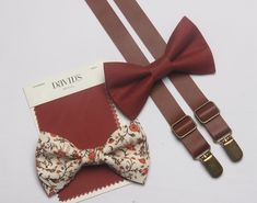 This tie/bow tie  is a Wedding Favorite ~it  is perfect for weddings or special occasions. Fabric: linen / cotton floral  Fabric Care: Dry-clean Only The default  ribbon of bow tie is white ribbon and the default color of suspenders is brown . If you want other colors, please remark in the note when you place order.   Return Policy: If you are unhappy with your item, be it damage, defect or otherwise, we will happily accept a return/exchange.  Returns must be unworn, unwashed, undamaged, and una Brown Bow Tie For Wedding, Brown Bow Tie For Wedding And Father's Day, Groomsmen Wedding Photos, Brown Suspenders, Grooms Suit, Groomsmen Bowtie, Bowtie And Suspenders, Ring Bearers, Tie Bow Tie