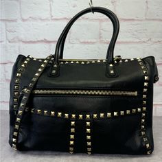 Authentic Valentino Garavani Rockstud Leather Shoulder Bag With Original Tags Very Good Condition Minor Wear Shown On One Side Leather Tab, See Photo Minor Scratch To Leather Handle Interior Is Clean Showing Minor Signs Of Wear. More Rare Style. A Lot Of Studs. No Missing Studs. Detachable Strap 12.2” Length 11” Height 3.75”Depth 6” Drop On Dual Handles 18” Drop On Long Strap Everyday Studded Bags, Studded Crossbody Bags For Everyday Use, Everyday Crossbody Bags With Studs, Rectangular Studded Shoulder Bag For Everyday Use, Everyday Use Rectangular Studded Shoulder Bag, Everyday Rectangular Studded Shoulder Bag, Studded Rectangular Bag For Everyday Use, Black Studded Bag For Everyday Use, Rectangular Everyday Bags With Studs