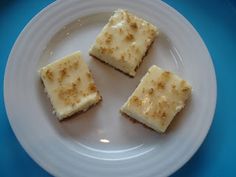 three pieces of cake on a white plate