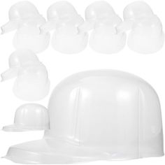 a white hard hat and several different types of helmets