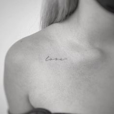 Small Tattoo Idea Minimal Collar Bone Tattoos For Women, Collarbone Tattoos For Women Writing, Love Word Tattoos For Women, Love Tattoos For Women Words, Minimalist Tattoo Love Yourself, Collarbone Tattoo Script, Babe Tattoo Word, Lover Word Tattoo, Lover Tattoo Word Font