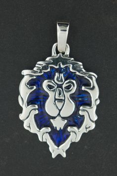 WoW Aliance Lion Pendant in Sterling Silver by LeDragonArgente Blue Symbolic Collectible Jewelry, Collectible Blue Sterling Silver Jewelry, Collectible Nickel-free White Gold Jewelry, Hallmarked Stainless Steel Jewelry, Collectible Nickel Free White Gold Jewelry, Symbolic Sterling Silver Collectible Jewelry, Collectible Symbolic Sterling Silver Jewelry, Geeky Jewellery, Gold Everything