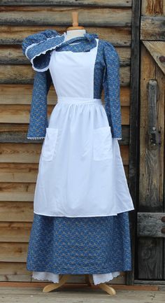 Blue-pioneer-dress-4pc Pioneer Woman Dress, Trek Clothing, Pioneer Costume, Pioneer Clothing, Pioneer Trek, Pioneer Dress, Colonial Dress, Pinafore Apron, White Elegance