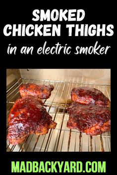 there are two ribs on the grill with text overlay that reads smoked chicken thighs in an electric smoker