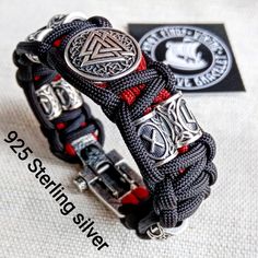 "Luxury gift for biker. Runic paracord bracelet.925 Sterling silver runes. Viking jewelry. Stylish handmade paracord bracelets for those who are always moving forward. These fashion accessories are made of extremely durable, scratch-resistant rope and original 925 Sterling silver beads runes.This bracelet contains 58 grams of pure 925 sterling silver. The castle weighs 14.74 grams, the 8 runes beads weighs 36 grams, and 1 round bead \"VALKNUT\" weigh 8 grams. These bracelets are ideal for both m Gift For Biker, Military Bracelet, Men Stuff, Paracord Projects, Metal Fashion, Paracord Bracelet, Mode Masculine, Woven Bracelets, Paracord Bracelets