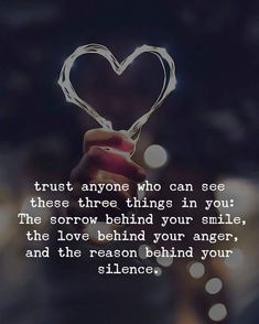 someone holding a heart shaped object with the words trust anyone who can see these three things in