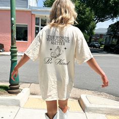 Get ready to fall in LOVE with your new Your Words Matter, Be Kind comfort colors shirt. This shirt features a back print and small butterfly on the front. It's the cutest and most comfortable way to show off the latest styles. Also makes a great gift! * PRODUCT DETAILS * ✺ 100% Cotton ✺ Medium weight fabric (super soft feel) ✺ Wash and dry normally (on cool for best results) ✺ Designed and printed in the USA ✺ Due to different monitor screens, colors may vary ✺ * SIZING * ✺ FOR AN OVERSIZED FIT Casual T-shirt With Back Print For Fall, Spring Cotton T-shirt With Back Print, Cotton T-shirt With Back Print For Spring, Cotton Spring T-shirt With Back Print, White Summer T-shirt With Quote Print, Summer Cotton T-shirt With Quote Print, White Short Sleeve Top With Quote Print, Casual Short Sleeve Tops With Quote Print, Oversized Letter Print Shirt For Spring