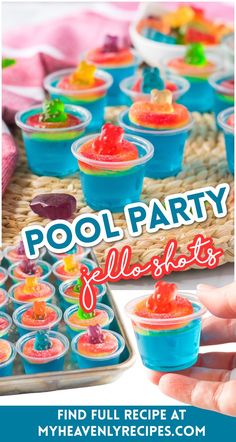 a hand holding a plastic cup filled with jelly bears and the words pool party jello shots