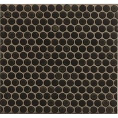 a black and white tile with circles on it