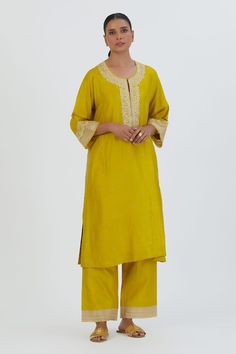 Lime yellow three fourth flared sleeves straight kurta in silk base with blossom embroideries on the yoke, sleeves hem and ditsy buttis detailing spluttered all over. Paired with a matching embroidered border palazzo. - Aza Fashions Elegant Yellow Kurta With Dabka, Yellow Slub Silk Palazzo Set With Straight Kurta, Elegant Yellow Palazzo Set With Straight Kurta, Elegant Yellow Straight Kurta, Yellow Slub Silk Straight Kurta, Elegant Yellow Chanderi Kurta, Elegant Yellow Slub Silk Sets, Elegant Yellow Kurta For Festivals, Elegant Yellow Kurta With Gota Work