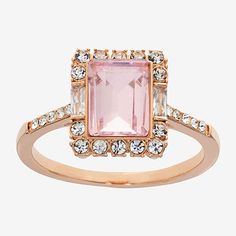 Ring Style: Engagement RingsFeatures: In A Gift Box, Nickel FreeShape: RectangleStone: CrystalStone Cut: BaguetteMetal Color: Rose ToneMetal: 18k Rose Gold Over BrassBand Width: 2mmCare: Polishing ClothStone Type: 2 Cubic Zirconia, 25 CrystalCountry of Origin: Imported Gold Rectangular Crystal Ring, Elegant Gold Rectangular Crystal Ring, Pink Rectangular Ring With Accent Stones, Pink Rectangular Stone Ring For Anniversary, Fine Jewelry Pink Rectangular Rings, Elegant Ring With Rectangular Stone And Halo Setting, Rose Gold Rectangular Ring For Anniversary, Rose Gold Square Cut Promise Ring, Rectangular Rose Gold Ring For Anniversary