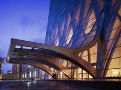 the entrance to an office building at night