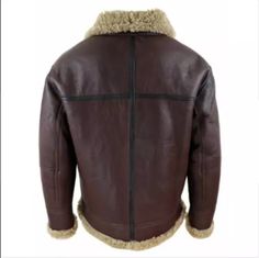 h2 { color: black; font-weight: bold; } Brown shearling leather aviator jacket with real sheepskin lining, combining warmth and a classic bomber look for versatile everyday wear. Pilot Leather Jackets Features Free Shipping: Available on all pilot leather jackets. Material: Made from 100% genuine real sheepskin leather for a durable and premium feel. Lining: Lined with faux fur, providing superior warmth and comfort. Care Instructions: Dry clean only by a leather specialist to maintain the jacke Leather Aviator Jacket, Metallic Cowhide Rug, Brindle Cowhide, Patchwork Cowhide Rug, Mens Leather Pants, Leather Waist Bag, Aviator Jacket, Leather Toiletry Bag, Real Leather Bags