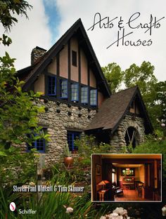 the front cover of an architectural magazine featuring a stone house with blue shutters and windows