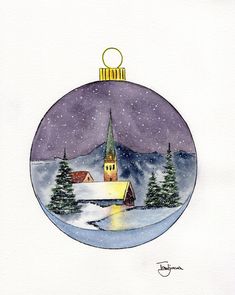 a christmas ornament with a church in the snow