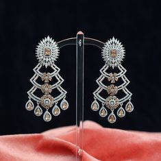 "Luxury bridal rhodium plated simulated Clear Cubic Zirconia chandelier long earrings for wedding, engagement, anniversary and valentine gifts for bridesmaids, Wife, Mother, Sister or Gift for Loved ones. Earrings lock is press or post type. Earrings Size: length: 3.25\" inches" Luxury Bollywood Style Chandelier Earrings As A Gift, Luxury Temple Jewelry Earrings For Anniversary, Silver Drop Earrings For Reception, Silver Chandelier Earrings For Reception, Silver Drop Chandelier Earrings For Reception, Silver Dangle Chandelier Earrings For Reception, Silver Chandelier Dangle Earrings For Reception, Chandelier Long, Diamond Earrings Indian