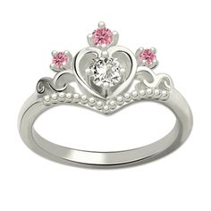 Multi-stone Princess Crown Ring In Sterling Silver Pink Diamond Accented Promise Rings, Pink Rings With Diamond Accents For Promise Occasion, Pink Diamond Accents Promise Rings, Pink Rings With Diamond Accents For Promise, Sterling Silver Crown Shaped Elegant Rings, Pink Promise Rings With Diamond Accents, Elegant Sterling Silver Crown Ring, White Promise Ring With Center Stone, Crown Shaped Cubic Zirconia Rings For Formal Occasions