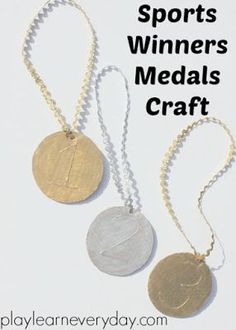 two gold and silver necklaces with the words sports winners medals craft