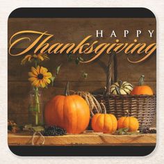 a thanksgiving card with pumpkins and sunflowers in a basket on a table