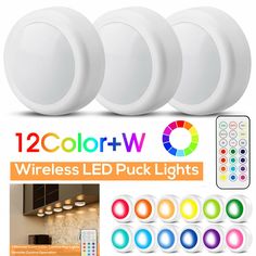 four white led puck lights with remote control and 12 color + w logo on the front