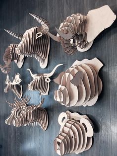 an image of some animals that are cut out of paper and placed on the wall