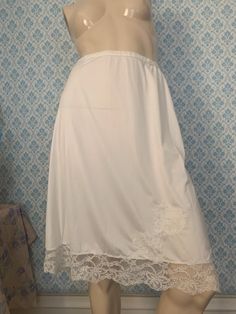 Generally good condition, no stains, vintage condition regarding the threading of the lace.  When laid flat the waist measures 23 but I am a 27 and it fits me comfortably. Elastic waist. 24 inches top to bottom. I can't say exactly when this was made but Artimus brand was popular in 40. 100% nylon, it's a high quality soft nylon. Feminine Lace Trim Bottoms For Wedding, Feminine Wedding Bottoms With Lace Trim, Fitted Lace Bottoms For Daywear, Cream Lace Trim Bottoms For Wedding, Vintage Fitted Wedding Bottoms, Vintage Style Stretch Bottoms With Lace Trim, Vintage Stretch Bottoms With Lace Trim, Stretch Vintage Bottoms With Lace Trim, Vintage Stretch Bottoms For Daywear