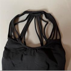 Vintage Capezio, Not Sold Anymore. Never Worn, No Signs Of Wear. Tag Is Not On The Leo, But I Would Say Best Fit For A Size Small. Black Top With Built-in Bra And Strappy Back, Black Tank Top With Built-in Bra And Strappy Back, Black Tops With Built-in Bra And Strappy Back, Sleeveless Stretch Dancewear Tops, Black Halter Neck Tank Top For Sports, Fitted Strappy Gym Tops, Black Fitted Tank Top With Strappy Back, Black Tops With Strappy Back, Black Halter Neck Sports Top