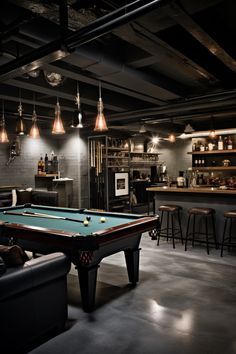 a pool table sitting in the middle of a living room next to a bar with stools