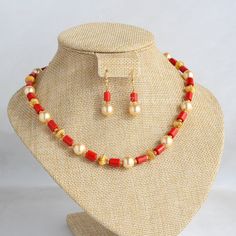 Embrace the allure of tradition with our Coral Pearl Necklace--a fusion of antique charm and Jaipuri elegance. This Mala set, a blend of traditional and fancy elements, features vibrant coral color beads and lustrous pearls. The necklace exudes sophistication, complementing any outfit effortlessly.  The matching earrings, at a modest one-inch length, add the perfect finishing touch. This personalized jewelry piece is my own design, and I welcome any customization requests. Elevate your style with this exquisite Indian jewelry. Length - 18 inch Coral Necklace Indian Gold, Pearl Bridal Jewelry Sets, Latest Necklace Design, Coral Jewelry Vintage, Pretty Gold Necklaces, Coral Jewellery, Coral Jewelry Set, Pearl Earrings Designs, Bridal Necklace Designs