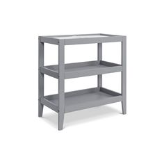 a gray shelf with two shelves on each side and one shelf below it, against a white background