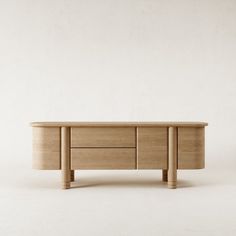 a wooden table with two drawers on each side