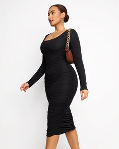 Finally, a perfect date night dress that you can't stop wearing! Styled with sneakers, sandals, or some killer heels, your new Smooth Ruched Shaping Dress look is versatile and effortless again and again. Smooth, tight, and showing off every curve of your body for the most flattering look. Why you'll love it!• Removable built-in padding. Designed & uniquely fit to flatter every cup size!• Mid-firm control for ultimate smoothing power.• It is ruched all over the front and back with a snug yet str Wedding Shapewear, Black Friday In July, Waist Trainer Workout, Tummy Shaper, Apple Body Shapes, Perfect Date Night, Pear Body Shape, Low Intensity Workout, Date Night Dress