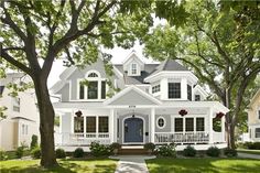 a large white house with lots of windows