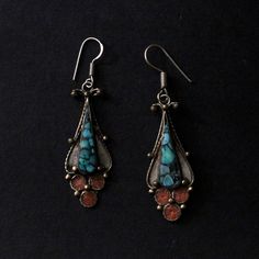 Natural turquoise and corals inlay on brass earrings Sterling silver ear wire Hand crafted Traditional Inlay Earrings As Gift, Traditional Bronze Teardrop Earrings, Traditional Inlay Earrings For Gift, Artisan Turquoise Metal Earrings, Traditional Nickel-free Copper Earrings, Turquoise Inlay Earrings As Gift, Artisan Drop Earrings With Patina, Traditional Blue Brass Earrings, Traditional Copper Nickel-free Earrings