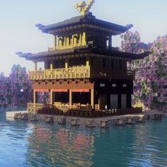 a large building sitting on top of a body of water next to purple flowers and trees