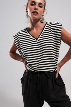 Sleeveless t shirt with shoulder pad in black stripe Szua Store Striped Sleeveless Top, Sleeveless T Shirt, Bold Stripes, Woven Top, Sleeveless Tshirt, V Neck Tops, Stripes Design, Black Stripes, Step Up