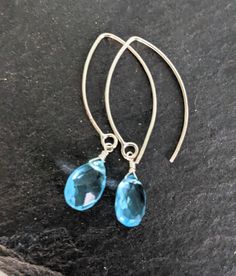 Swiss Blue Topaz Sterling Silver Teardrop Long Earrings, Handmade Gemstone Earrings, Marquis Hoop Earrings.  The earrings measures 1.6''( 41 mm. ) * Processing time is 3 - 5 days.  * US orders are shipped first class mail. * International orders are shipped first class international. * Shipping upgrades are available at checkout. Thank you for visiting my listing! Have a wonderful day! Blue Teardrop Gemstone Hoop Earrings, Handmade Blue Topaz Teardrop Earrings, Teardrop Blue Topaz Earrings, Swiss Blue Topaz, Long Earrings, Gemstone Earrings, Earrings Handmade, Blue Topaz, Jewelry Earrings Dangle