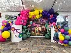 an entrance decorated with balloons and decorations