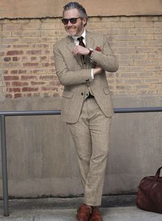 Classic Tweed Suits With Suit Collar, Formal Tweed Three-piece Suit With Notch Lapel, Tweed Three-piece Suit With Notch Lapel For Business, Classic Herringbone Suit For Semi-formal Occasions, Classic Semi-formal Suit With Herringbone Pattern, Formal Tweed Suit With Suit Collar, Formal Three-piece Tweed Suit With Notch Lapel, Classic Semi-formal Herringbone Suit, Semi-formal Fitted Herringbone Suit