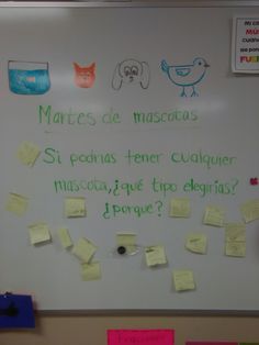 a bulletin board with post - it notes on it and writing in spanish, french or spanish