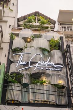 the outside of a building with plants growing on it