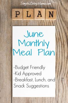 a meal plan on top of a wooden table with scrabbled words that read june monthly meal plan, budget friendly kid approved breakfast, lunch, and snack suggestions