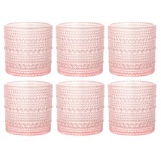 six pink glass cups with dots on them